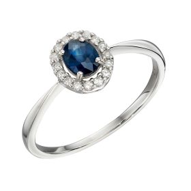 Blue Sapphire Ring with Diamond Cluster Surround